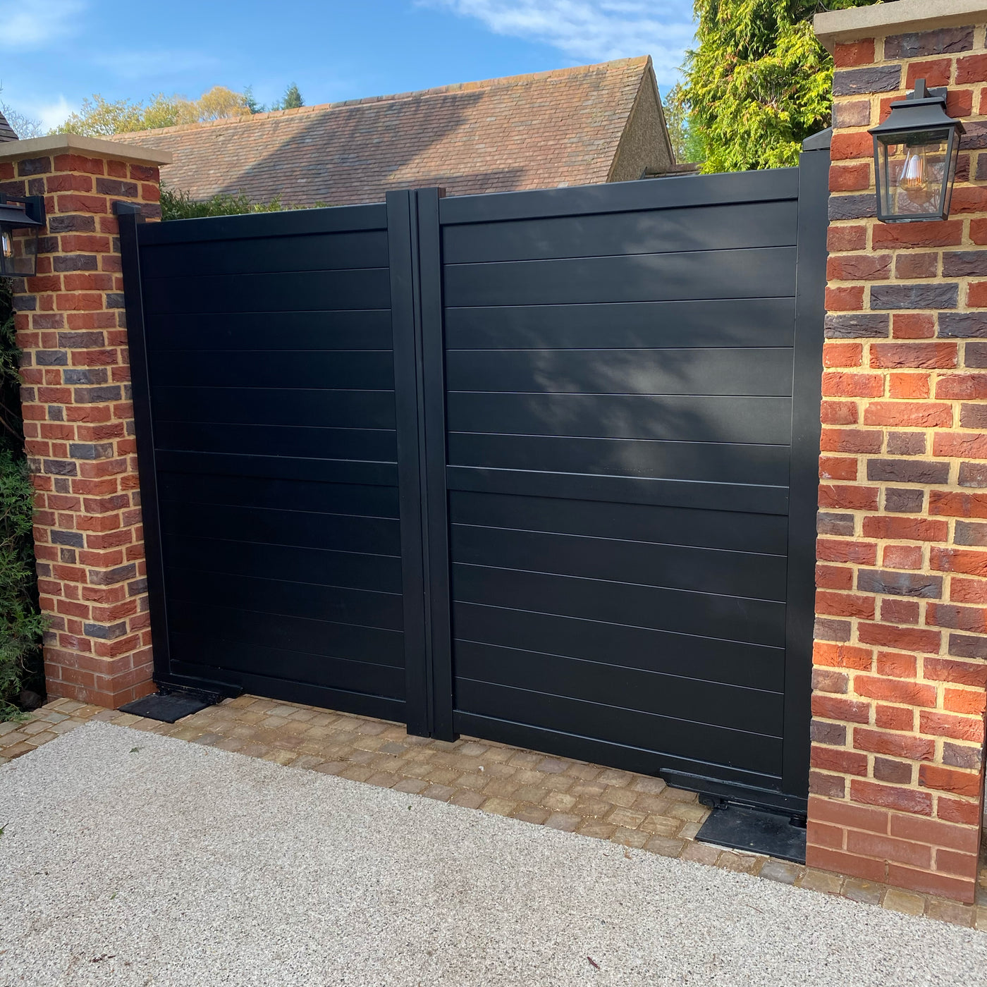 Double-swing driveway gates